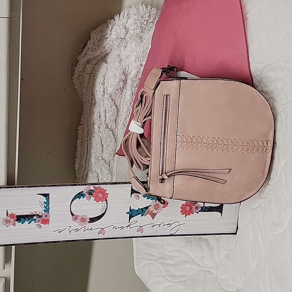 Large, attractive cross body or over the shoulder purse.